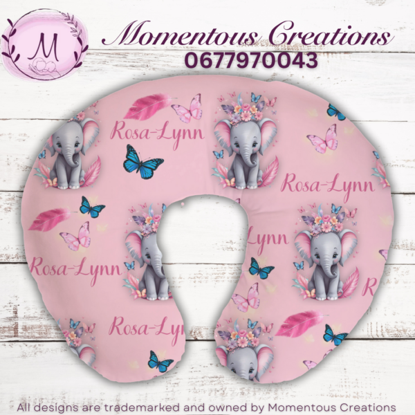 Pink elephant feeding pillow
