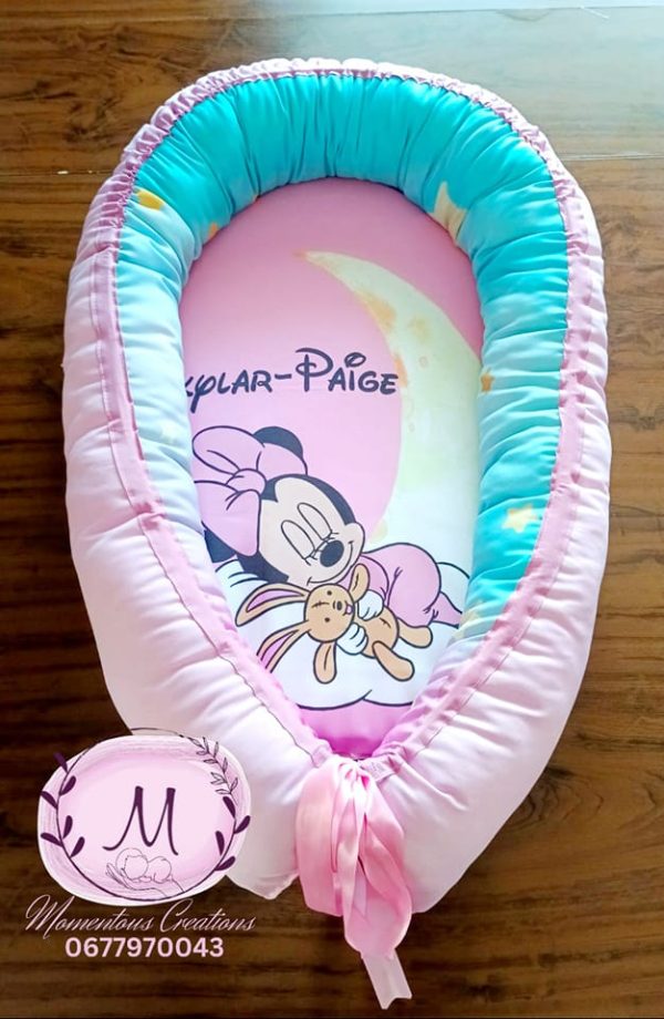 Pink Minnie mouse baby nest