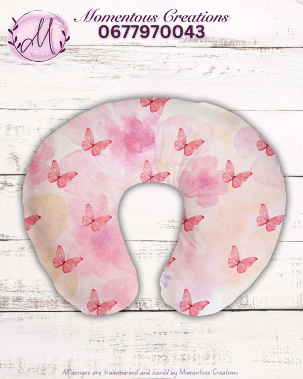 Pink butterfly feeding pillow