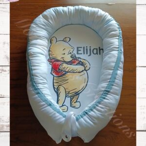 Blue Winnie the pooh baby nest
